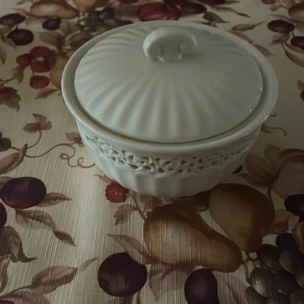 I Godinger and co . Ivory colored bowl with cover